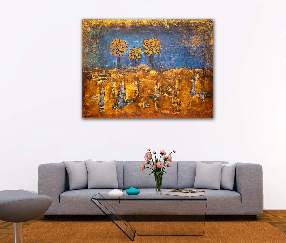 Abstract painting above a sofa